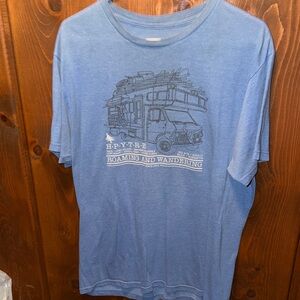Patagonia Light Blue Graphic Tee with Wandering PNW graphic